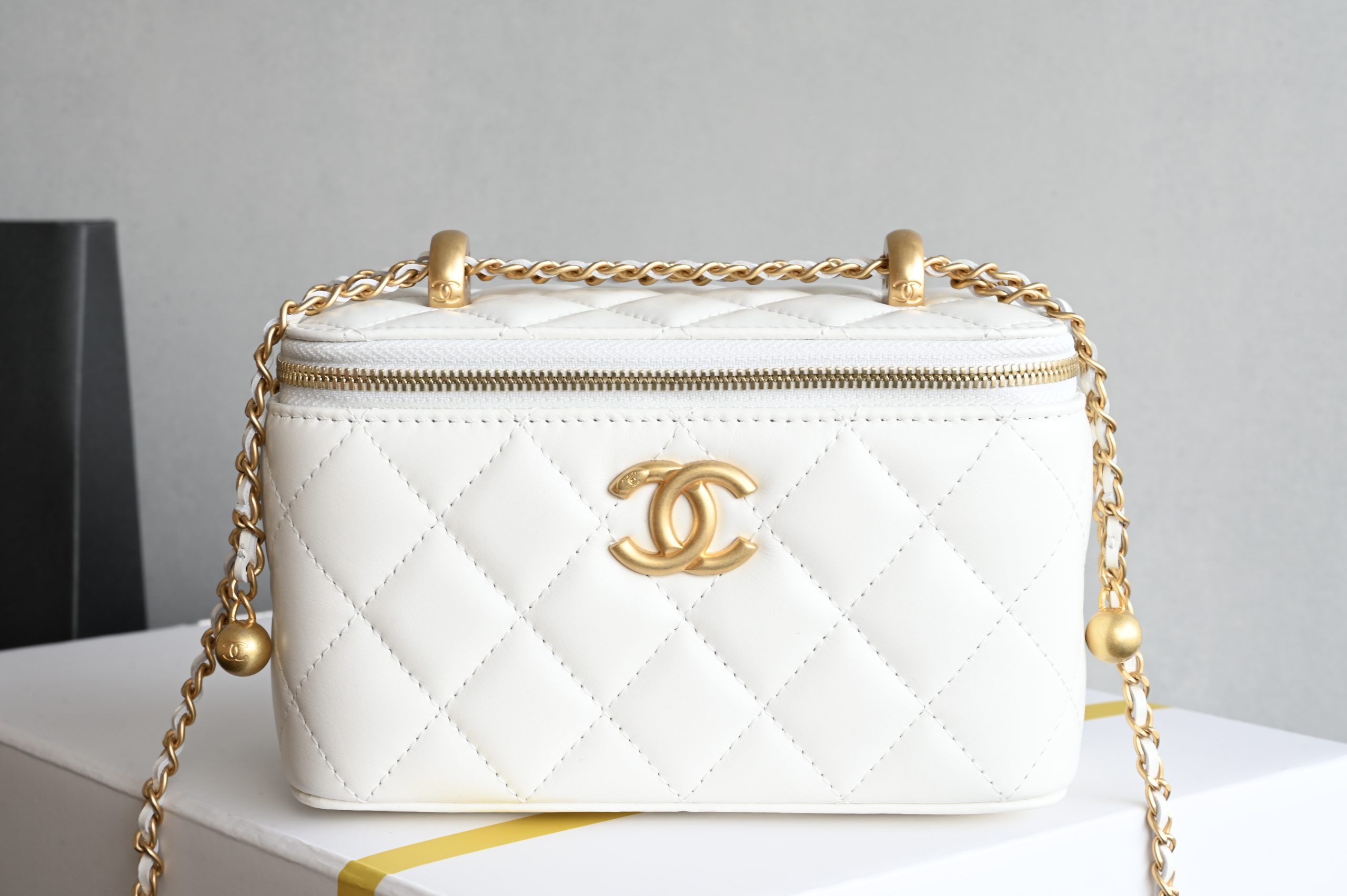 Brand new version small gold ball double chain cosmetic bag